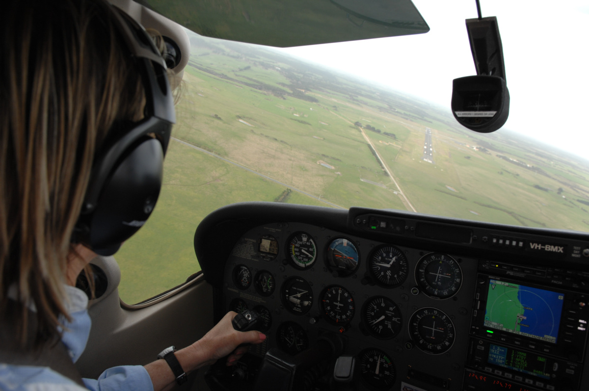 Plane approaching airport - view from cockpit