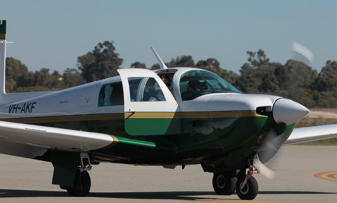 Plane on runway at Innisfail Airport