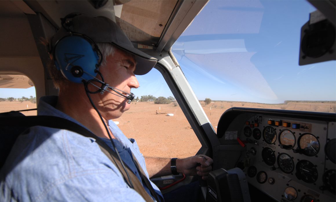 Pilot in the cockpit of a plane at Atherton Airport