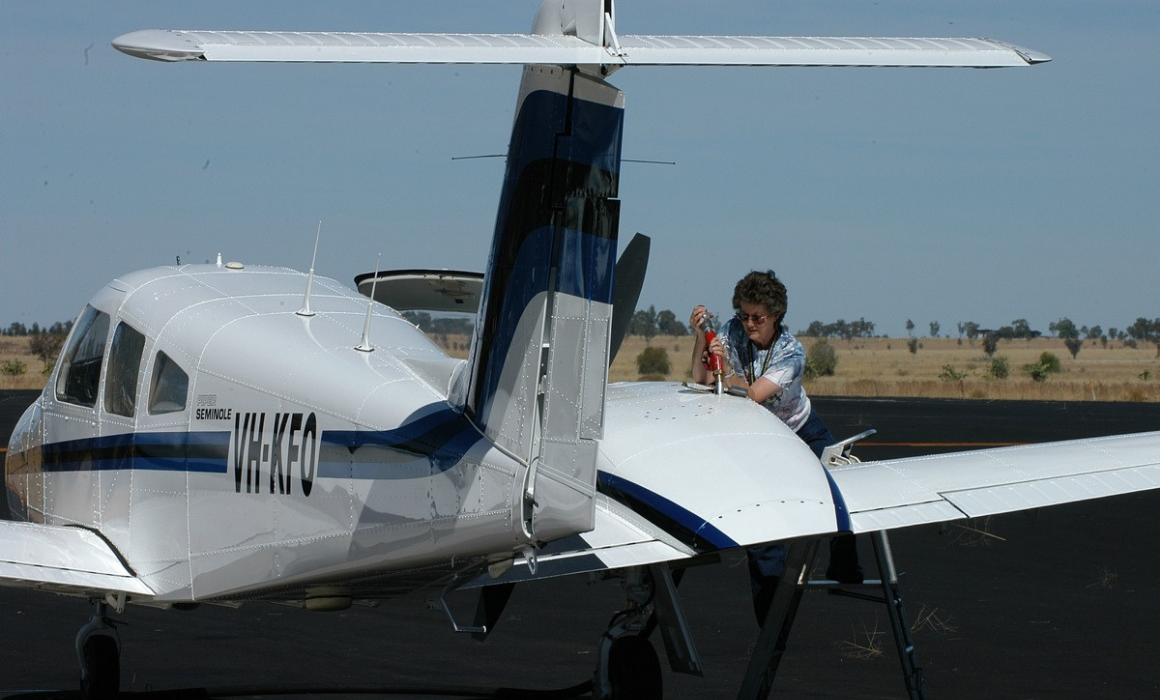 Pilot checking his plane