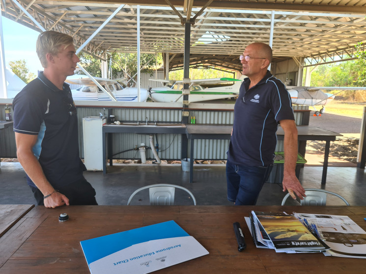 Pete Ball, aviation safety advisor chats to pilot Harrison Fox