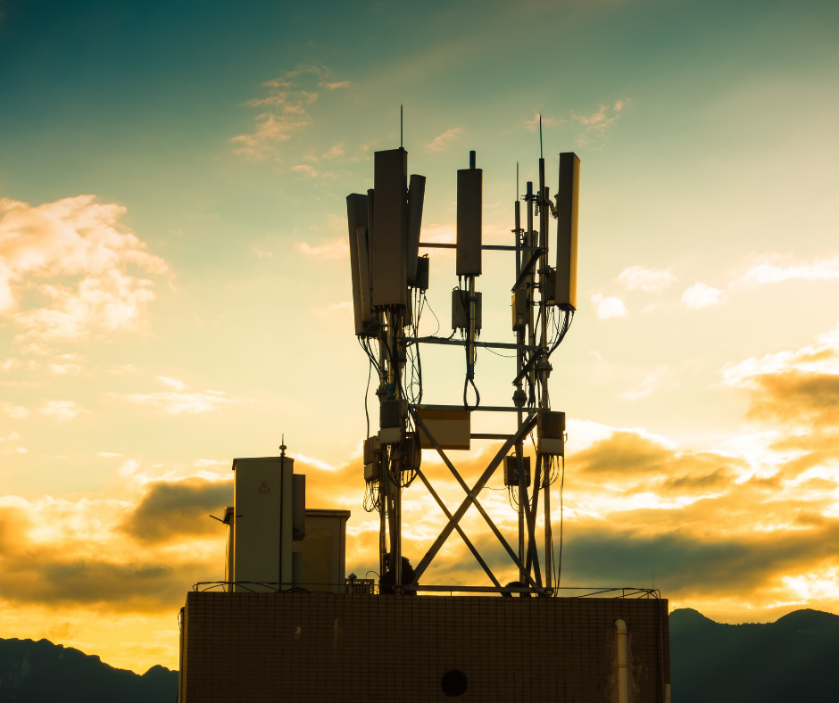 Picture of a telecommunications tower at sunset