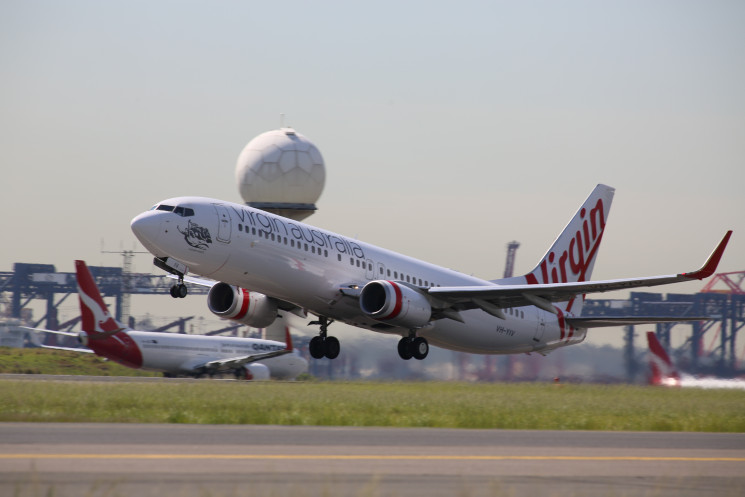 An airplane is taking off at Sydney airport