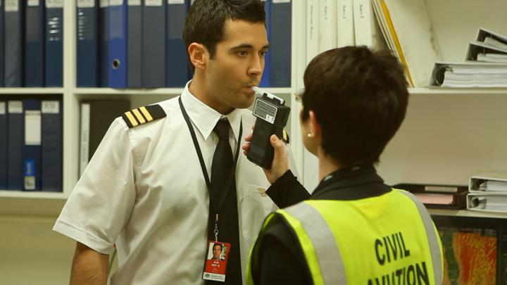 CASA officer conducting alcohol breath test