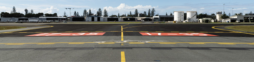 The taxiway holding point for entering runway 17-35 at the Gold Coast airport