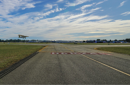 A taxiway holding point at Jandakot aerodrome, seen from the ground