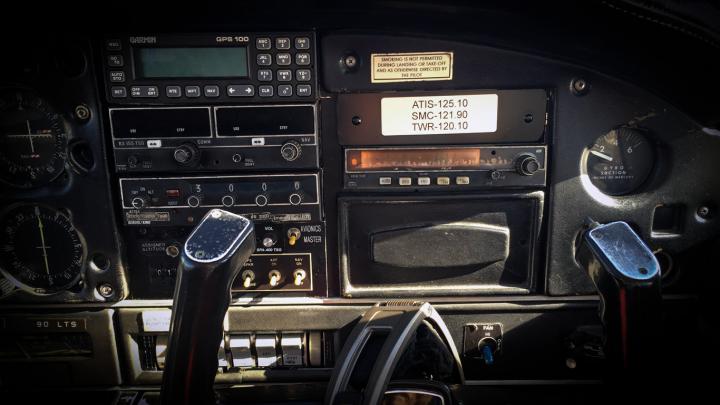 Aircraft cockpit displaying radio frequencies