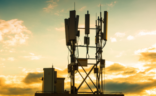 Picture of a telecommunications tower at sunset