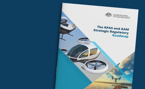 A photo of the print version of the RPAS roadmap, showing its cover, on a dark blue background