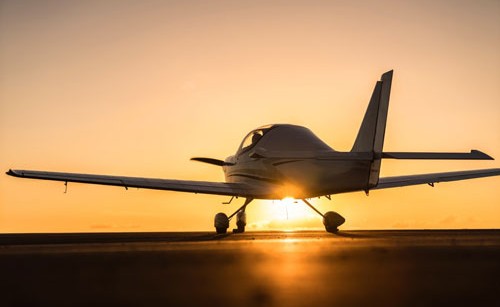 A plane is landed on the ground