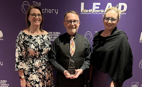 CASA staff members receive the LEAD award