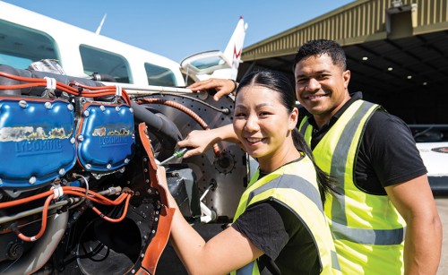 Engineers completing aircraft maintenace