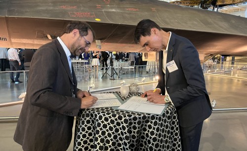 Giancarlo Buono, Group Director of Safety and Airspace Regulation, UK CAA, and Richard Stocker, National Manager, Airworthiness and Engineering Branch, CASA sign a technical arrangement