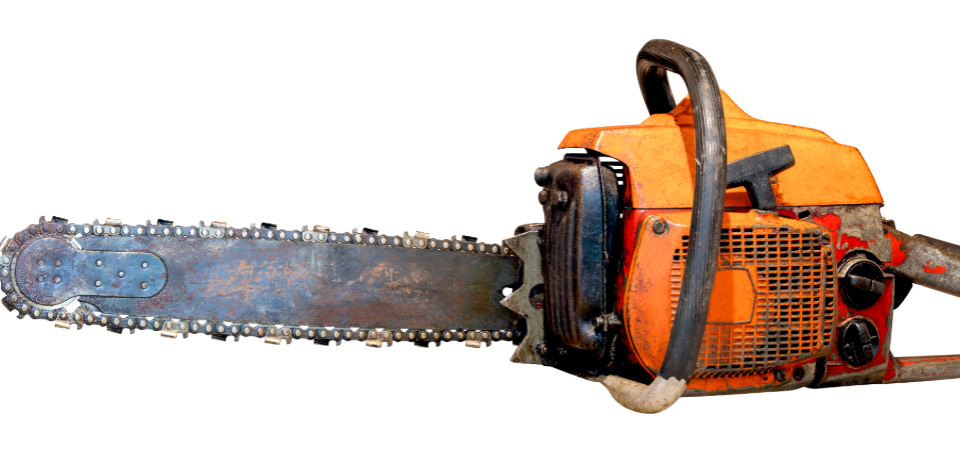 A well-used chainsaw on a blank white background