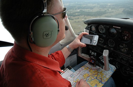 A pilot plans his approach
