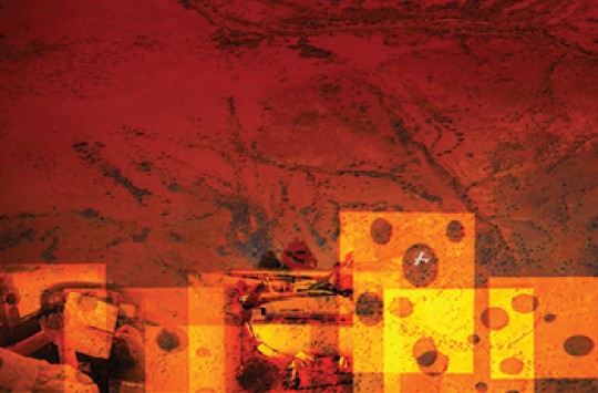 An aerial view of Alice Springs with translucent images of slices of swiss cheese laid on top of it and each other