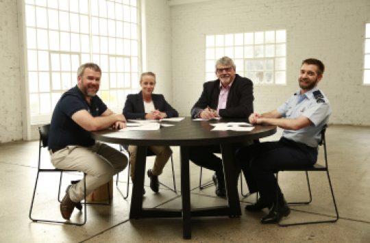 Four aviation experts sitting around a table