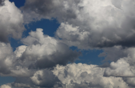 Dark grey clouds covering the sky