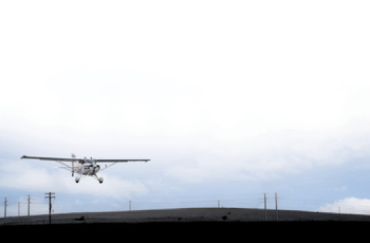 image of a plane about to landing