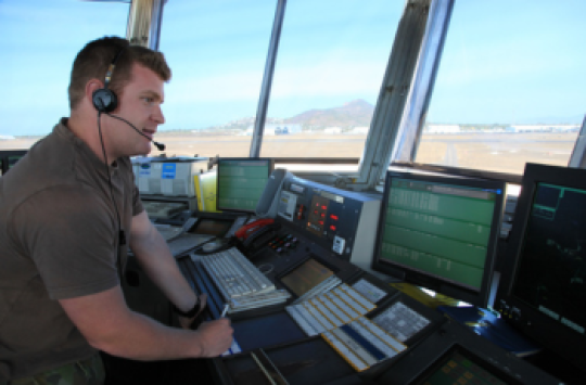 Image of an aviation expert in the tower