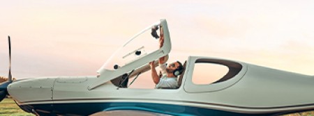Image of pilot lifting canopy on aircraft
