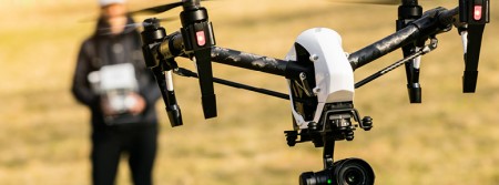 Drone flying in field