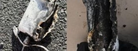 Power bank showing damage from the back (left) and side view (right)