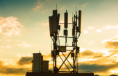 Picture of a telecommunications tower at sunset