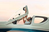 Image of pilot lifting canopy on aircraft