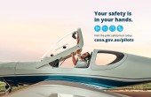 A pilot closing the cockpit of his aircraft. At the top left, the CASA Logo: "Australian Government - Civil Aviation Safety Authority"; below it, above the pilot, the words "Your safety is in your hands", with four icons below that. In the bottom-right corner, the URL casa.gov.au/pilots