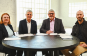 Four expert panellists sitting around a table