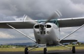 A plane preparing to take off on a cloudy day