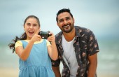 A man and his daughter flying a drone together