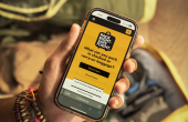 image of a person holding a mobile