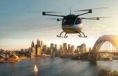 An AAM vehicle flying over Sydney Harbour