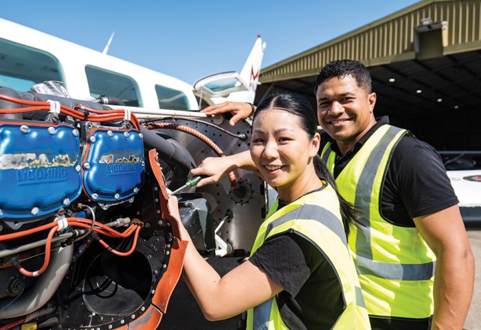 Engineers completing aircraft maintenace