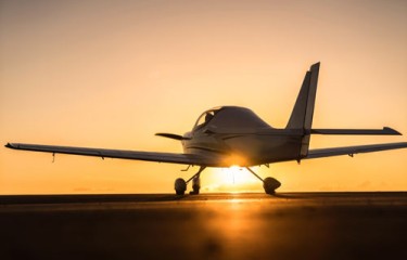 A plane is landed on the ground