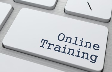 Closeup of keys on a keyboard, one labelled "Online Training"