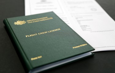 A flight crew licence sitting on a table