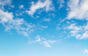 Fluffy white clouds on a blue sky