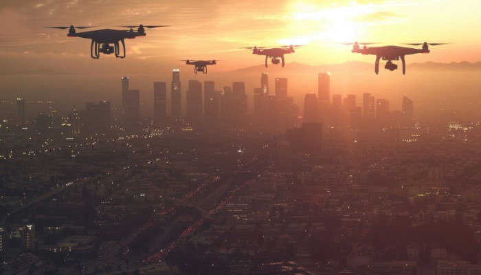 image of drones flying in the sky