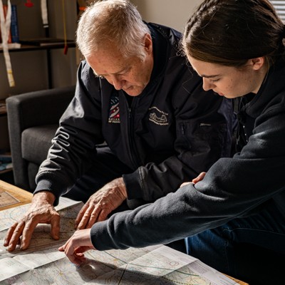 Two pilots planning a flight